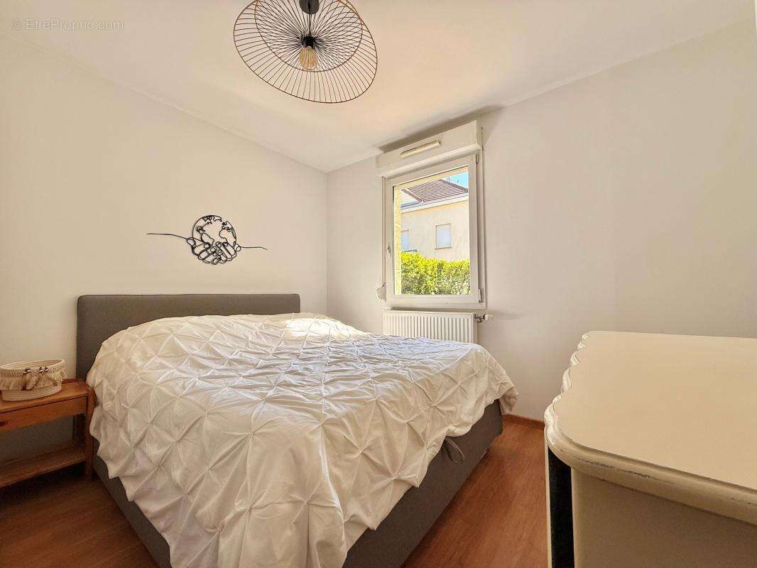 Appartement T3 avec jardin privatif et place de stationnement - photo 8