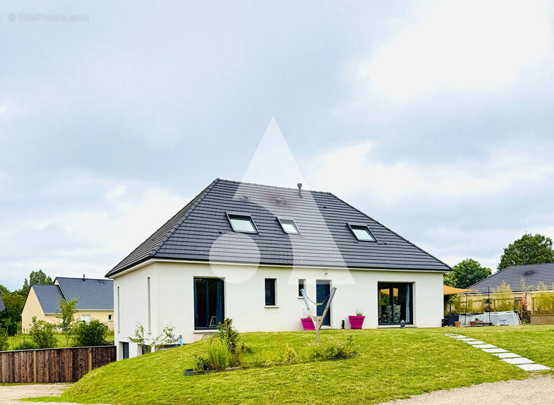 Maison à SACQUENVILLE