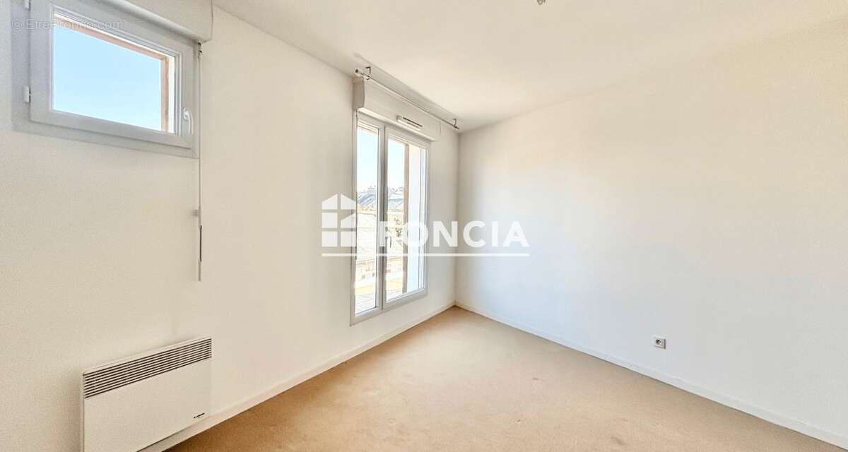 Exclu foncia : appartement 72m2 - terrasse 47m2 - 2 chambres - stationnement couvert - photo 6