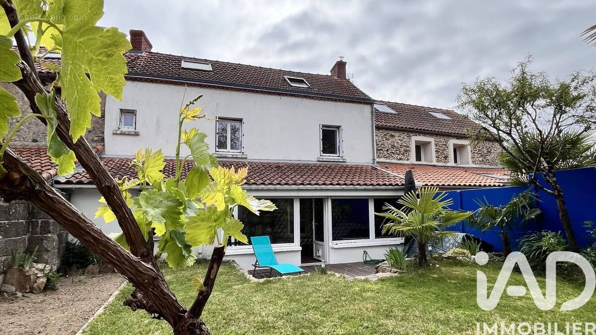 Photo 1 - Maison à BOUGUENAIS
