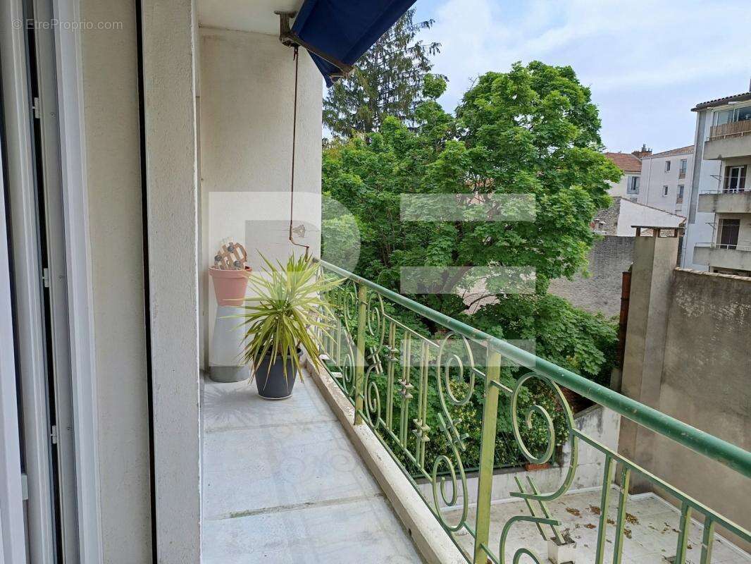Nîmes centre - quartier st baudile - appartement traversant type t3 de 74 m2 avec cave et garage - photo 4