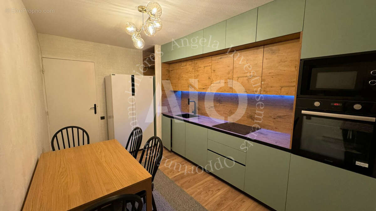 Appartement T3 Bis traversant d'une surface habitable de 68,37 m2 au 2ème étage avec ascenseur avec cave et ga - photo 2
