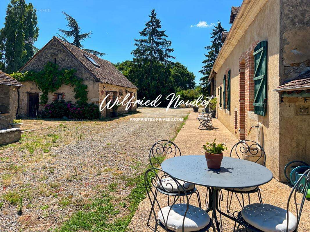 Maison à PARIGNE-L'EVEQUE