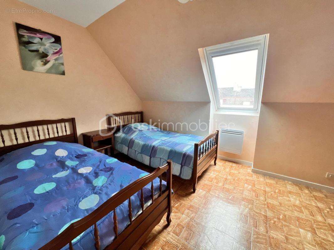 Maison familiale 4 chambres – 118 m² habitables – Sous-sol complet de 87 m² – En impasse, au calme - photo 9
