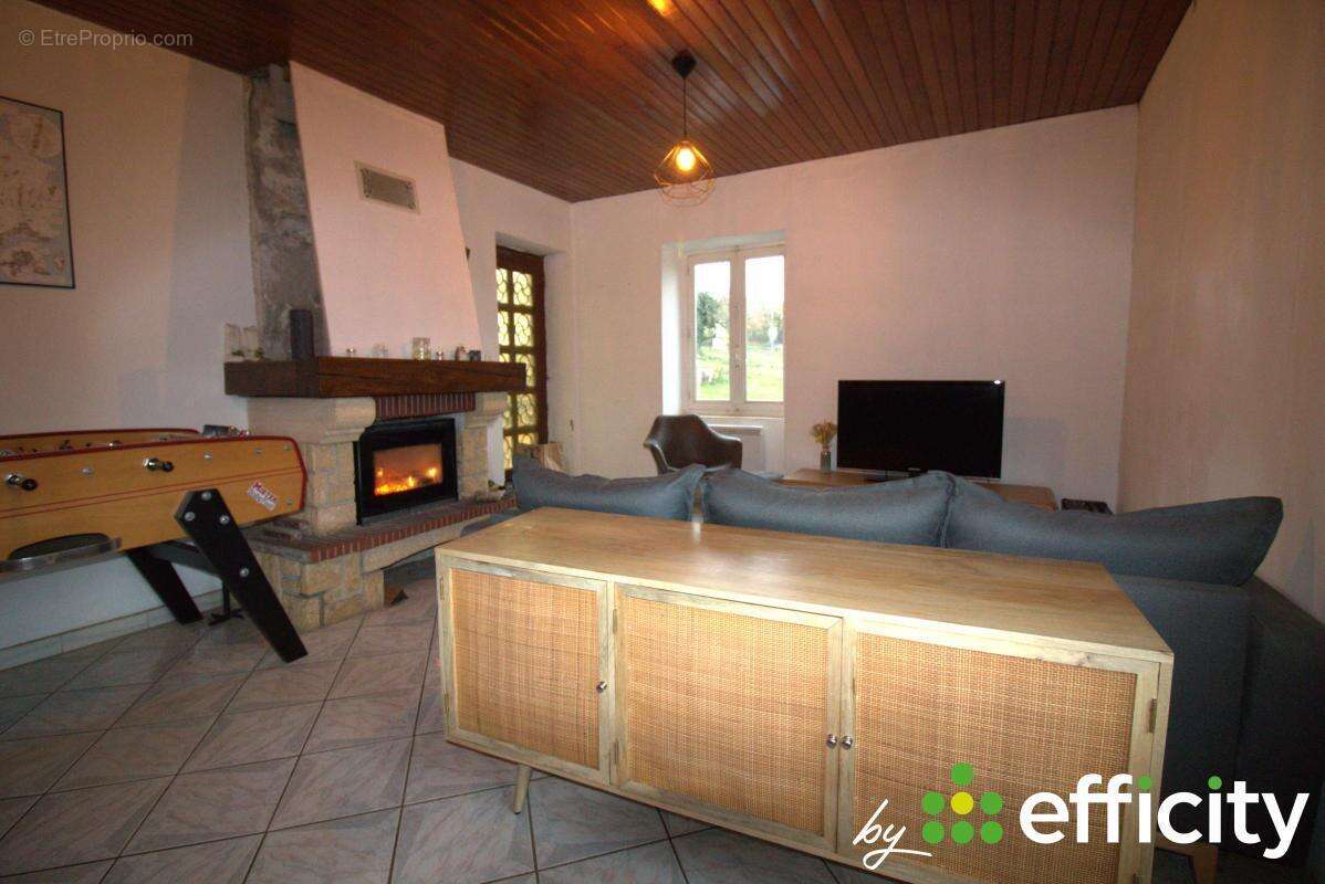 Maison à SOURCIEUX-LES-MINES