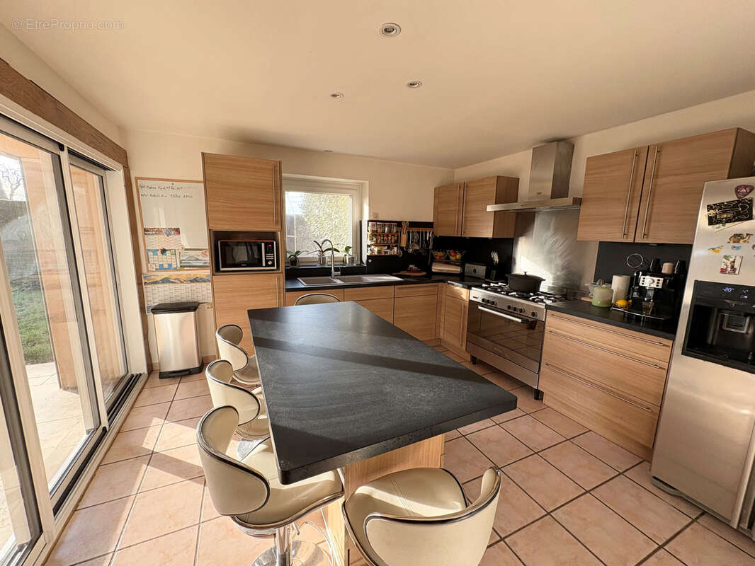 Maison à SAINT-JEAN-DE-THURIGNEUX