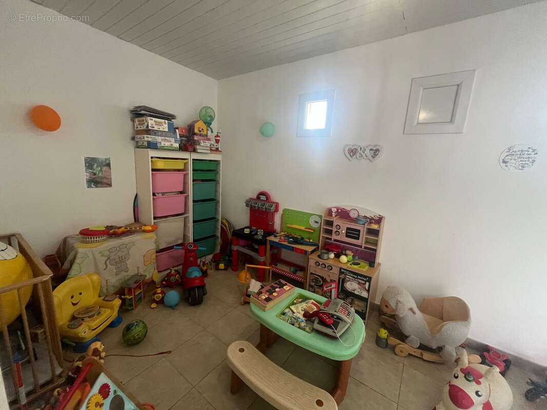 Maison de plain-pied de 76,22 m2 et un mazet - photo 7