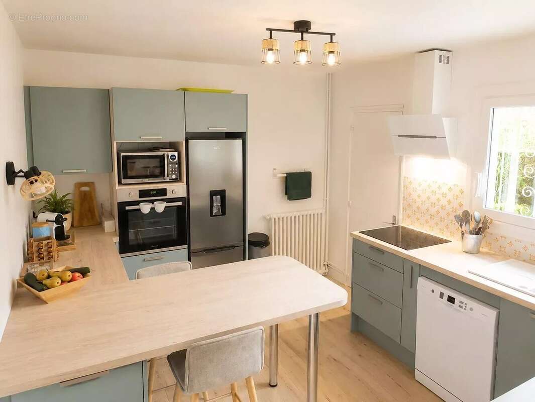 Maison de plain-pied avec trois chambres et agréable jardin - photo 4