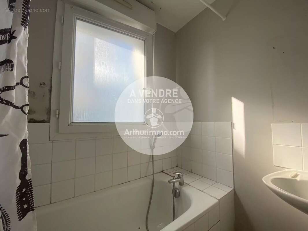 Appartement T3 de 65 m2 avec jardin privatif. - photo 6