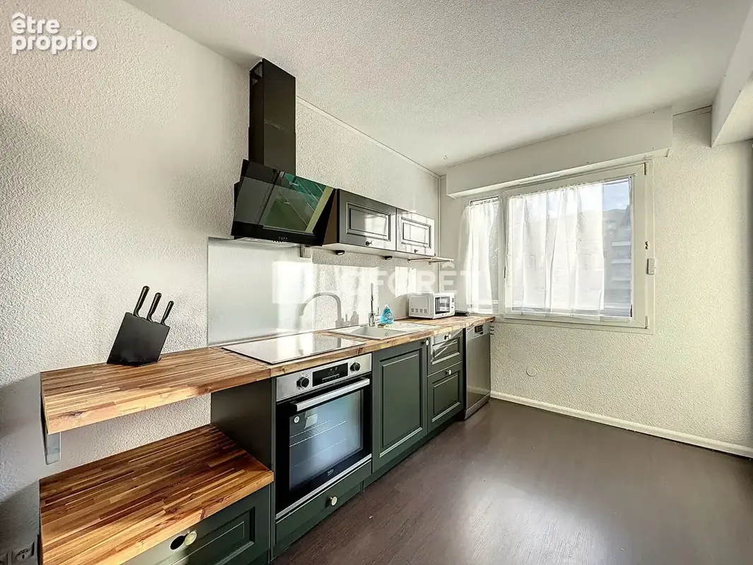 T5 de 83,01 m²  4 chambres  balcon  cave  au calme - photo 3