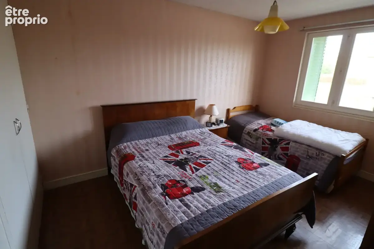 Jolie villa de 117 m² à fort potentiel avec un beau terrain arboré à CURCIAT DONGALON (01) - photo 11