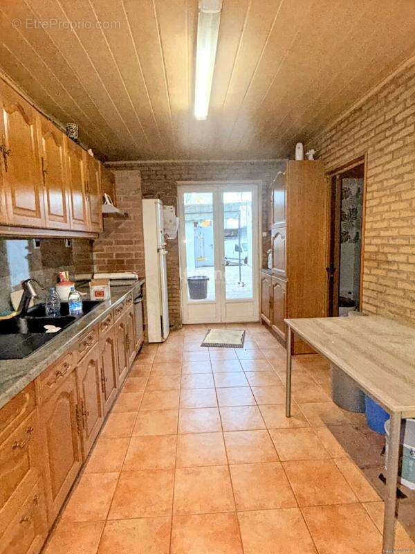 Maison à QUIEVRECHAIN