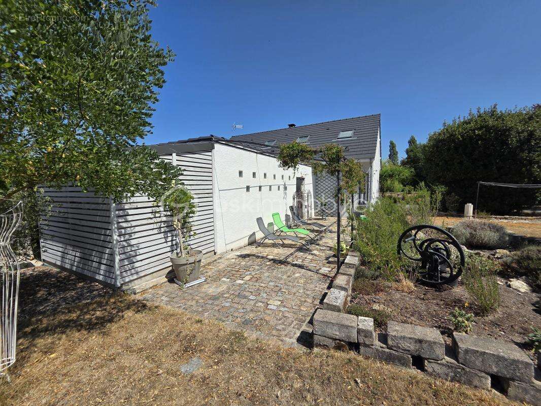 Magnifique Pavillon de plain pied de 149m² avec patio et dépendances à Avril sur Loire - photo 28