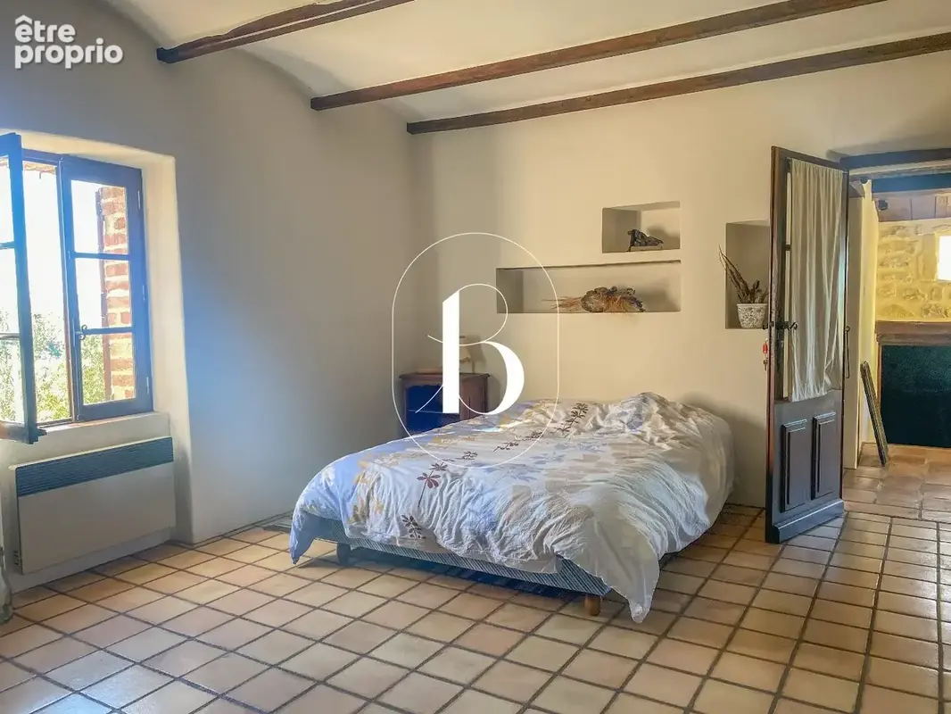 Une maison de caractère où l'histoire rencontre l'art de vivre - photo 14