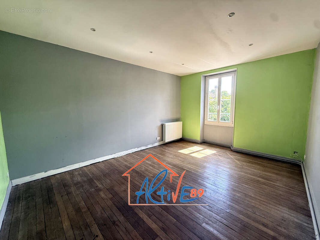 Maison familiale de 187m2 avec 4 chambres et fort potentiel à Bonnard - photo 10