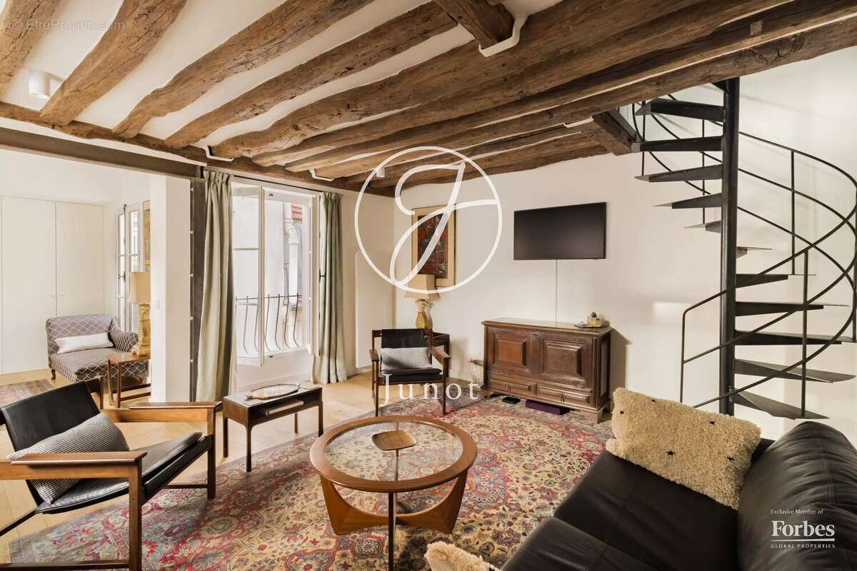 Paris 7e - CARRÉ DES ANTIQUAIRES - Duplex à vendre - 2 pièces - 39,24m² Carrez - 57,53m² au sol - 1 chambre - Dernier étage. - photo 16