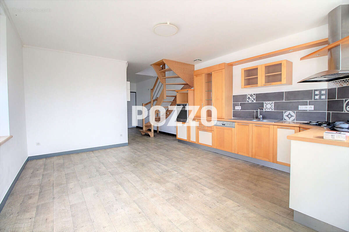 Appartement à DONVILLE-LES-BAINS