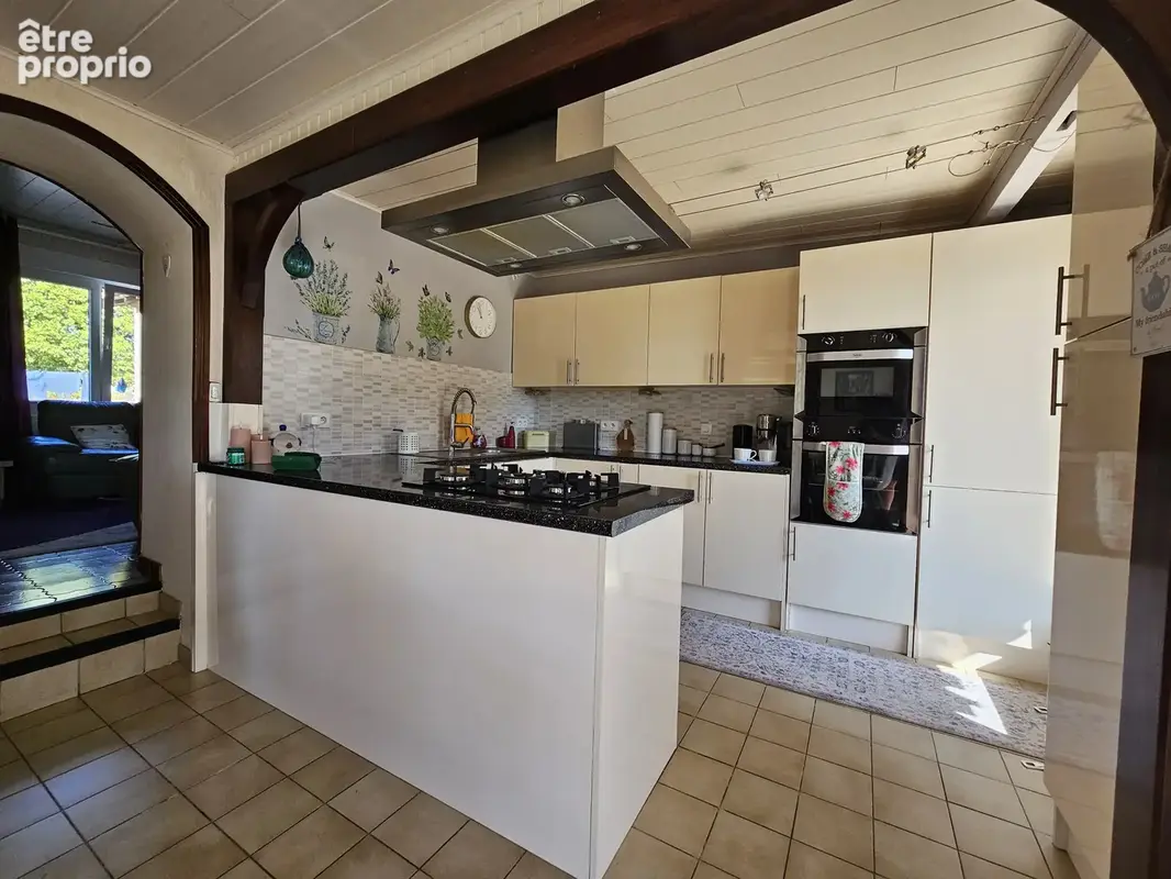 Une maison facile à vivre, avec un beau potentiel d'agrandissement - photo 4