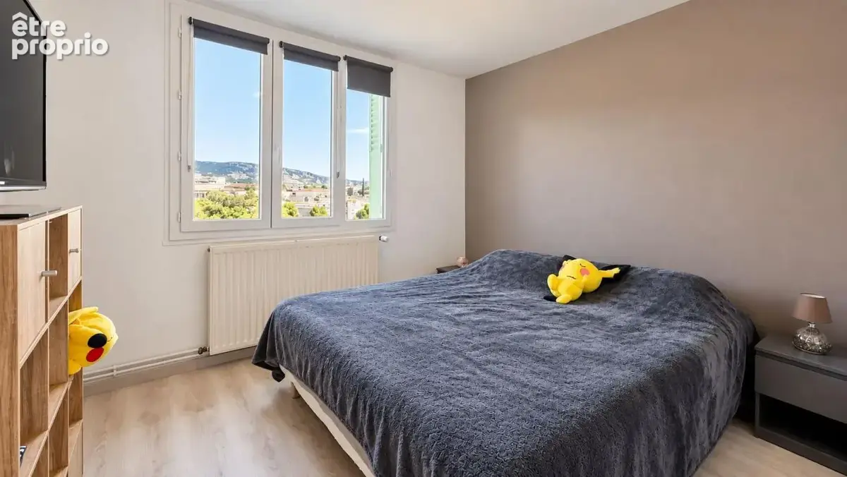 Valence - T4 de 63 m² - deux balcons - cave - garage privatif - parking collectif - photo 7