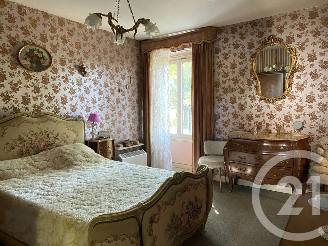 Maison 4 pièces 105 m² à vendre à Sury-En-Vaux (18300) - photo 8