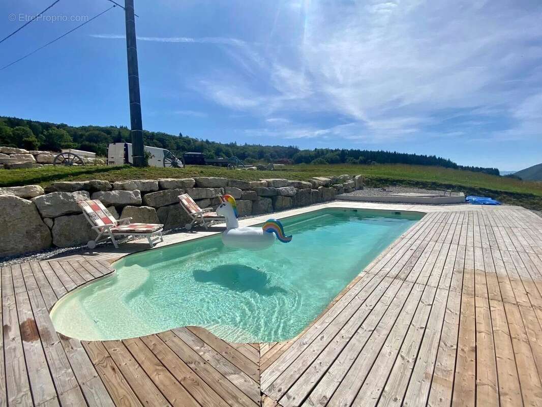 Maison à THEZILLIEU