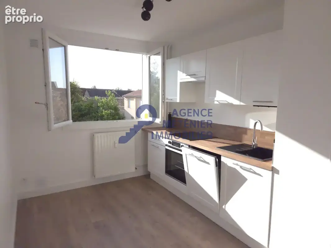 Appartement de 73 m2 au 1er étage avec cave et stationnement - entierement renove - photo 5