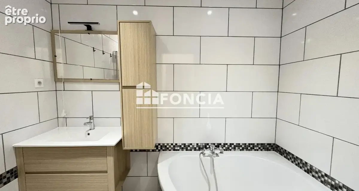 Appartement T4 de 103 m² avec climatisation au 1er étage centre-ville - photo 5