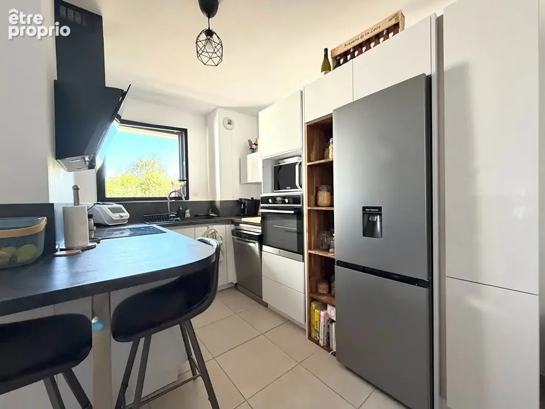 T2 ultra moderne de 54 m² avec grande terrasse, vue sur parc et parking couvert privatif - photo 4