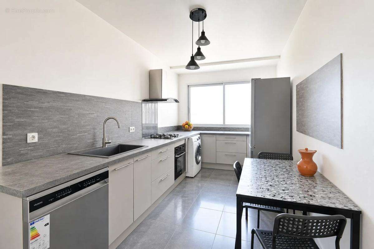 Appartement 4 pièces de 72 m² vendu loué - photo 4