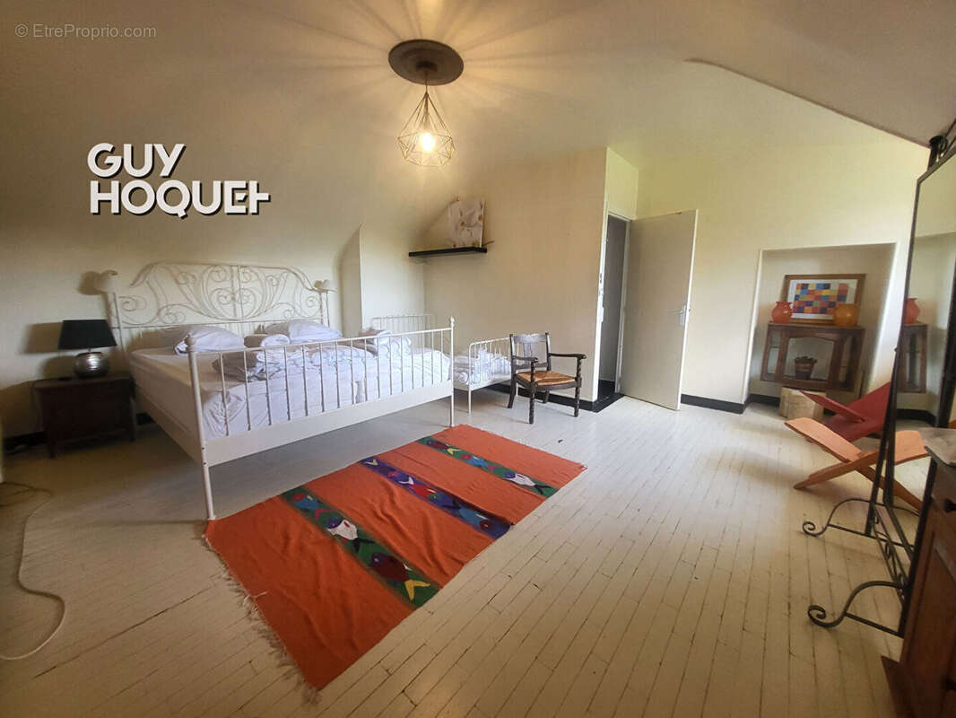 À seulement 2 minutes du Lac des Settons ? Belle maison en pierre rénovée de 201 m² avec terrain et dépendances - photo 11