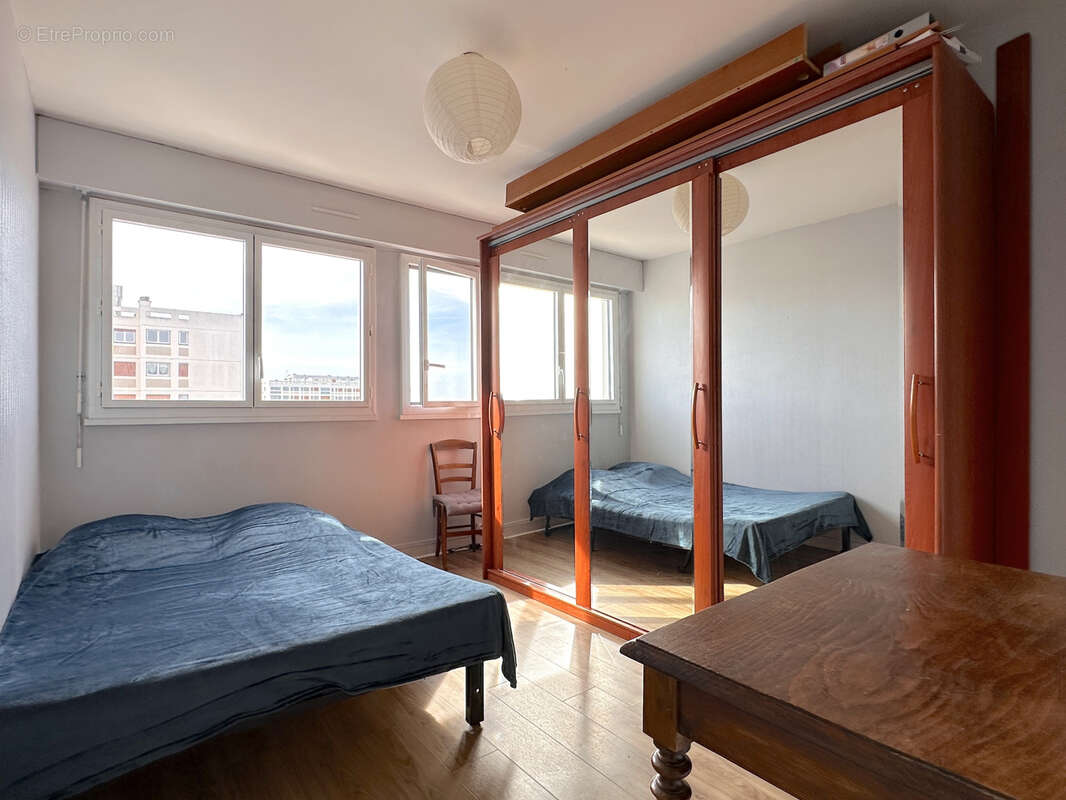 Appartement T4 de 88 m2, 3 chambres, loggia et parking - photo 9