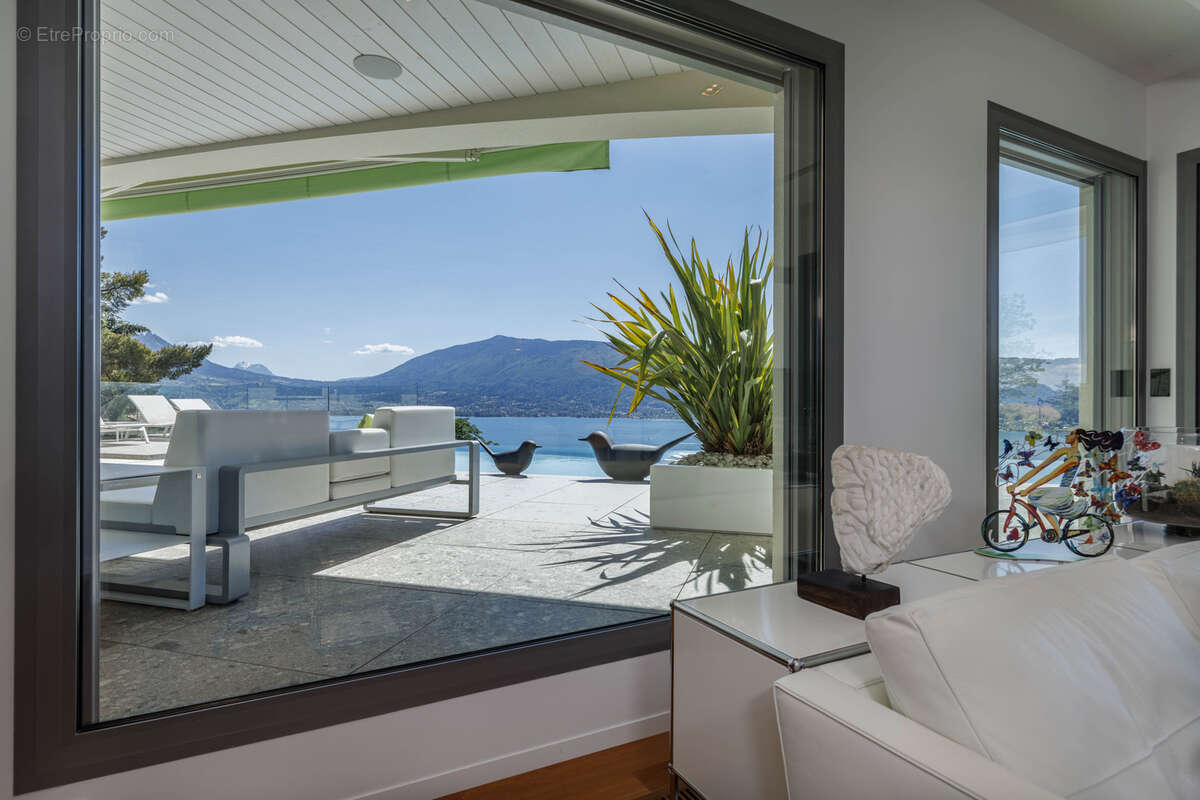Villa d'exception dominant le lac - photo 38