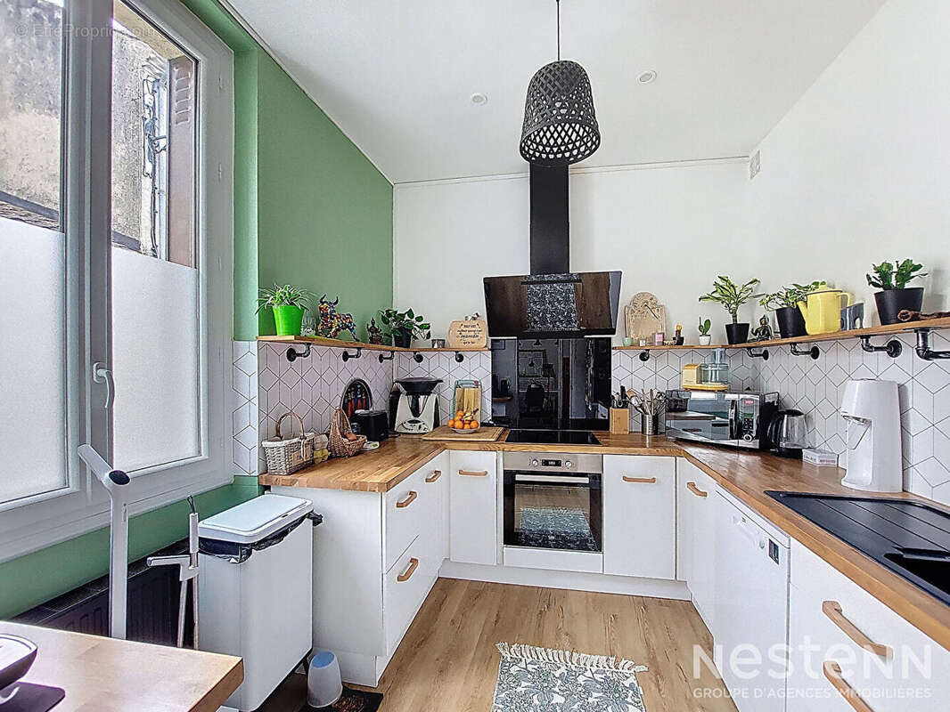 A Vendre Maison en pierre entièrement rénovée de 86 m² avec jardin et dépendances au coeur de Mézin - photo 2