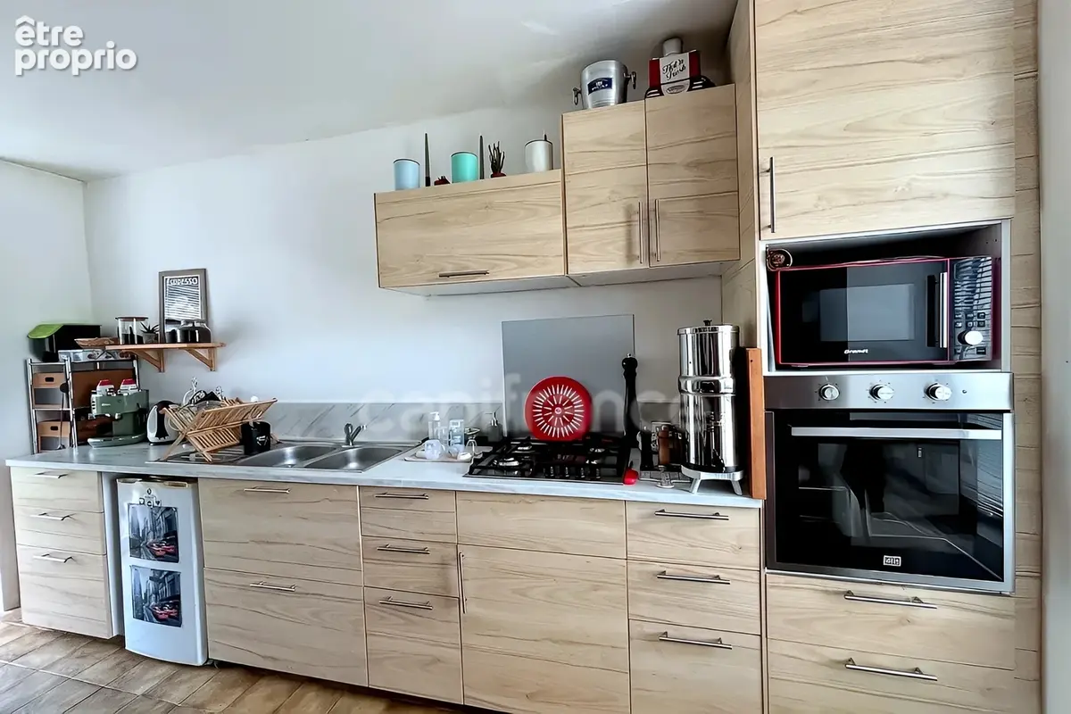 Charmante maison en pierre de 122m², 3 chambres avec jardin, terrasse, cave à GUENGAT(29) - photo 6