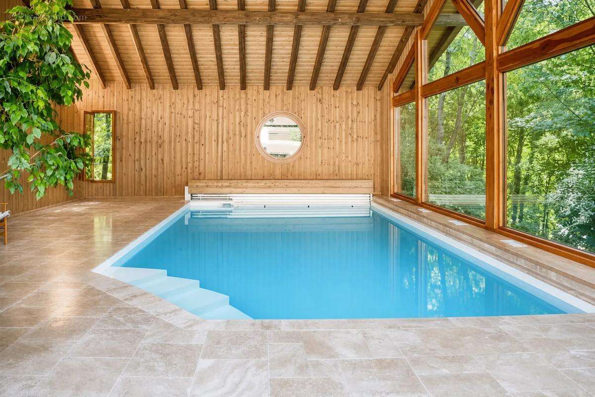 Propriété familiale avec espace bien-être et 8 600 m² de nature - photo 16