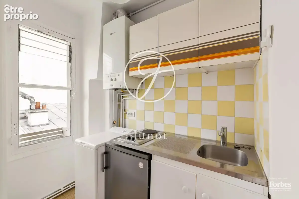 Paris 18e - JULES JOFFRIN / RUE DES CLOYS - Appartement  - 27,85m² Carrez - 2 pièces - Dernier étage - photo 9