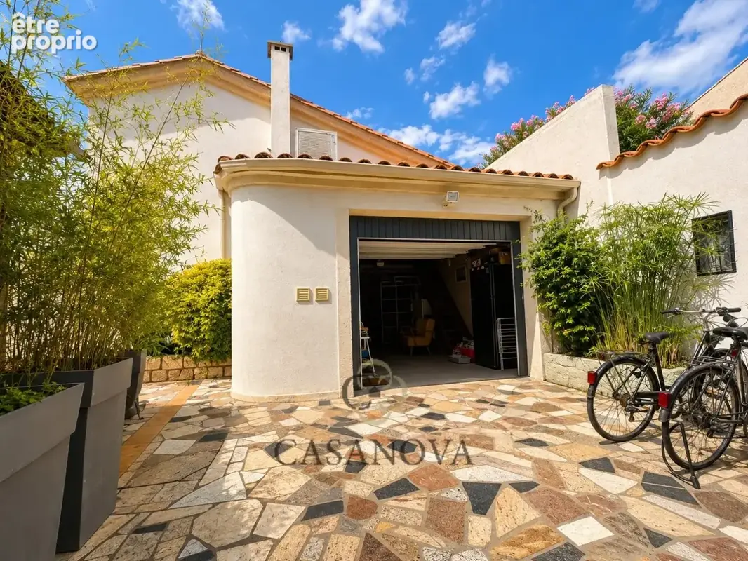 Maison 191 m² avec jardin paysager, jacuzzi et garage au centre de Pérols - photo 34