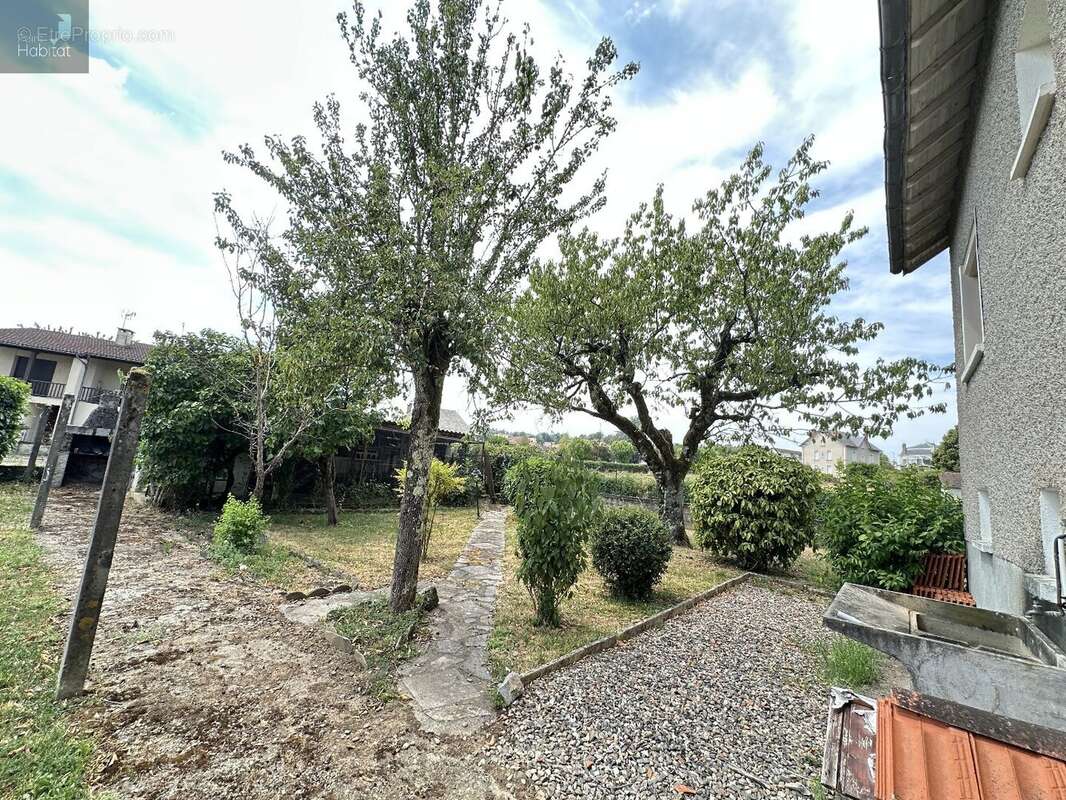 Proche du centre ville, quartier calme, Maison 4 chambres, garage, sur terrain de 630m² - photo 5