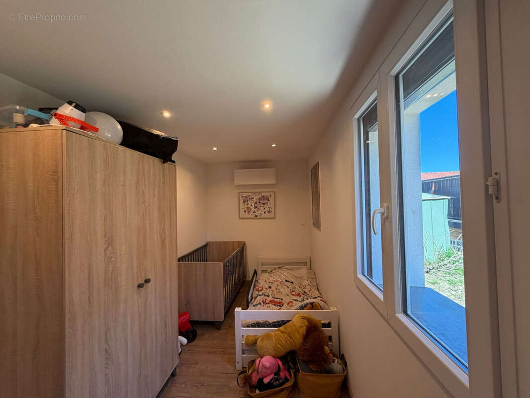 Maison 104 m² à Cervens  - photo 8