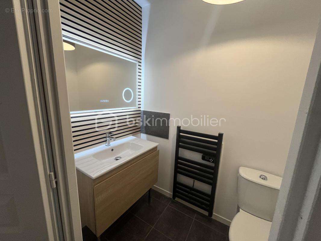 Appartement T2  de 55 m² avec grand balcon et cave - photo 7