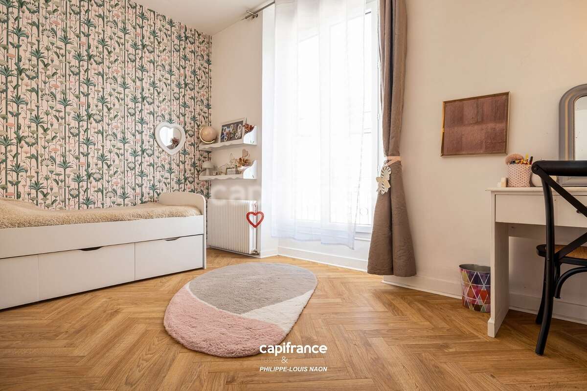 Appartement de style haussmannien d'exception avec grande pièce à vivre de plus de 70m2 - photo 7