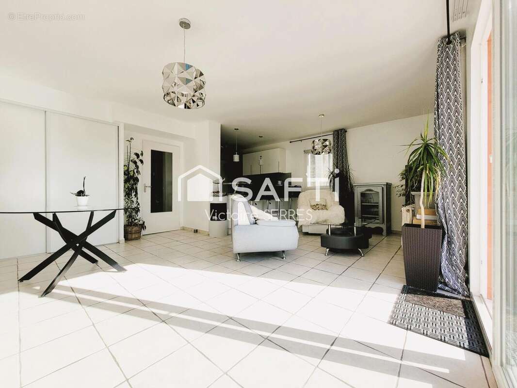 Photo 2 - Appartement à HEROUVILLE-SAINT-CLAIR