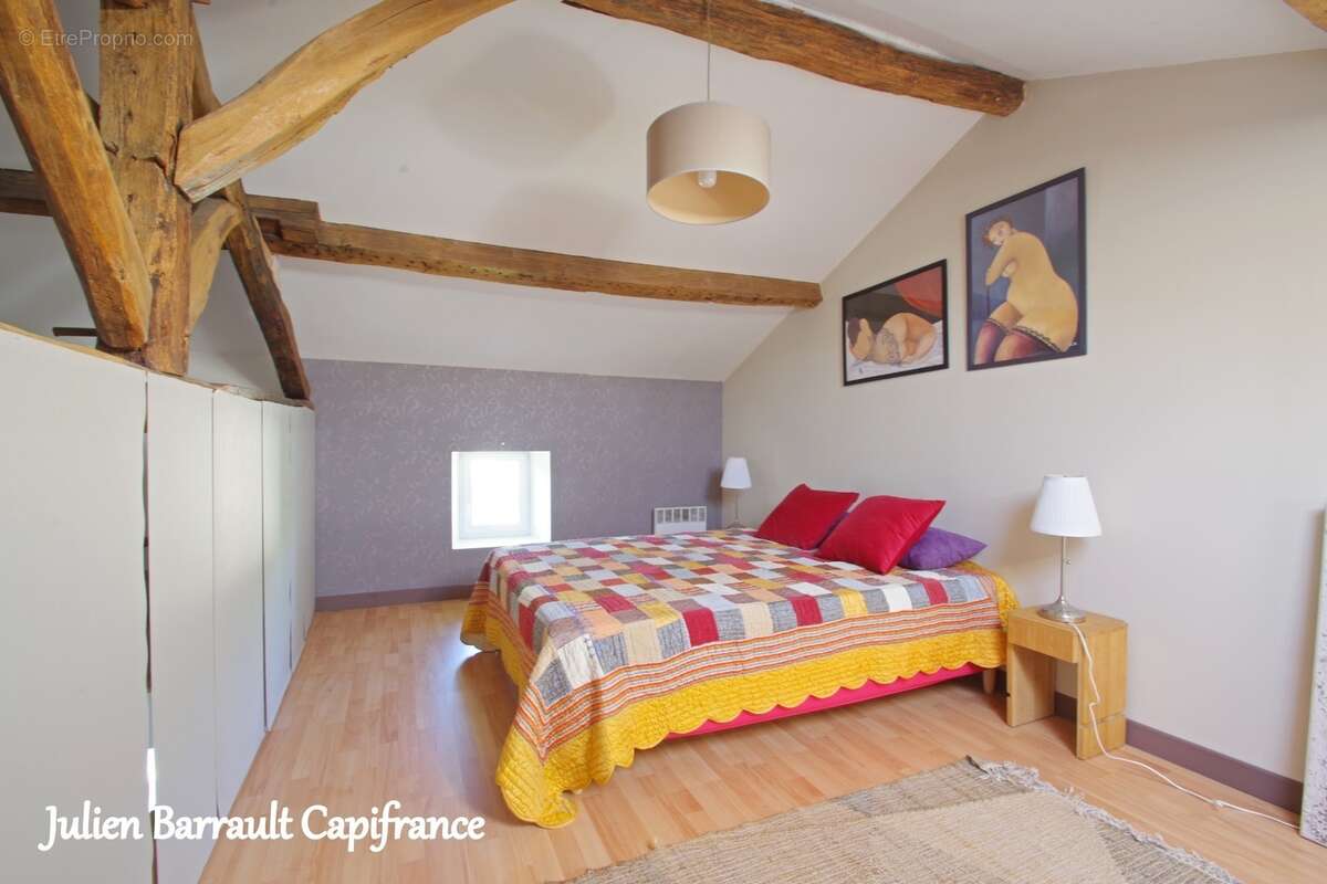 Maison familiale en pierre de 150m² avec 3 chambres rénovée en 2006 sur un terrain arboré et clos de 1617 m² - photo 19
