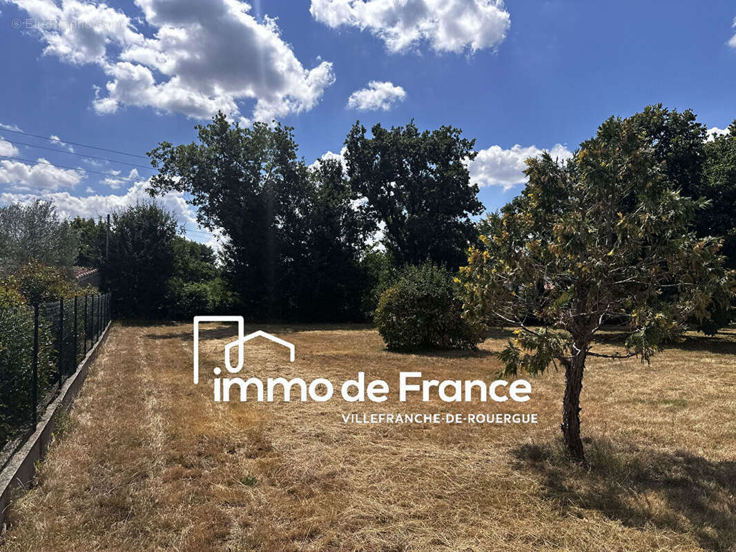 Villefranche De Rouergue, terrain à bâtir de 1877 m² plat et arboré, quartier calme - photo 3