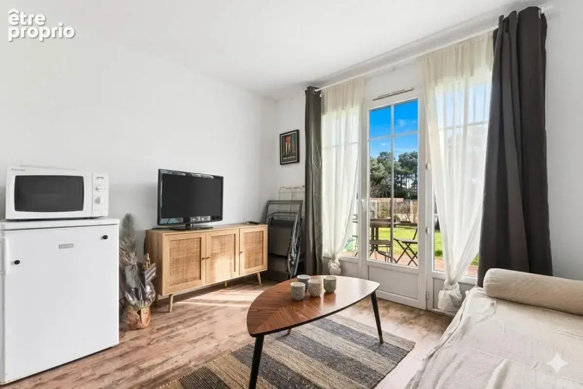 Appartement T2 proche Golfs,  offrant un cadre de vie privilégié et verdoyant au milieu des pins - photo 3