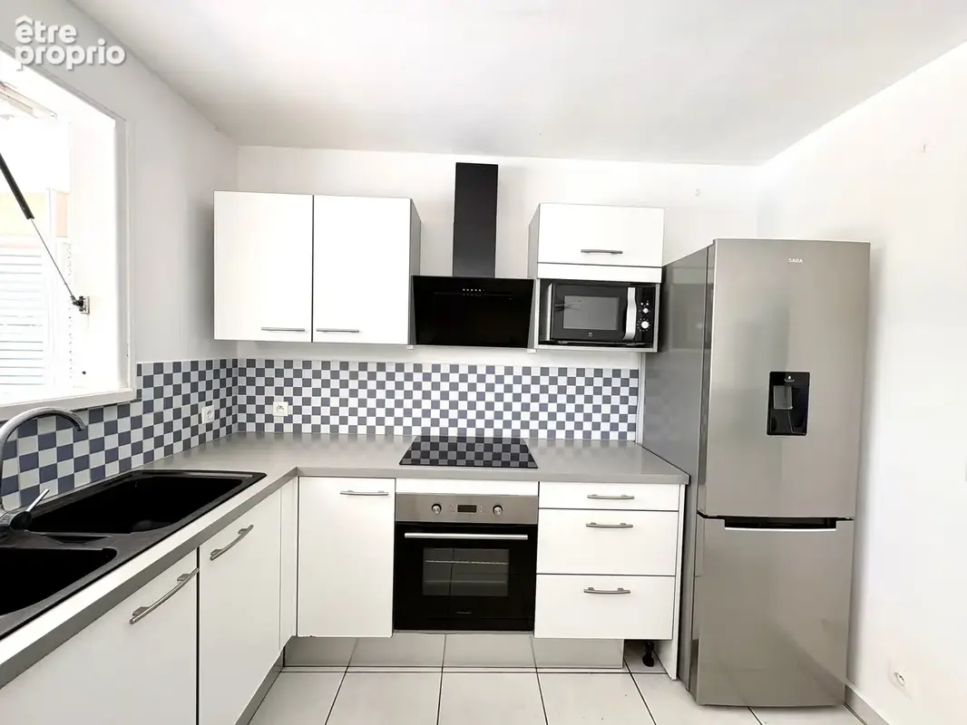 Maison F4 de 114 m2 avec garage, piscine, citerne et jardin clos de 580 m2 - photo 6