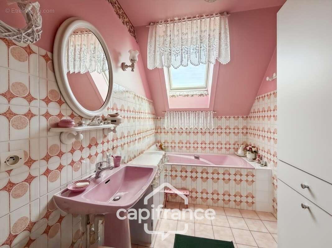 Duplex coup de coeur- l'espace d'une maison en appartement-2 caves et parking en sous sol - photo 10