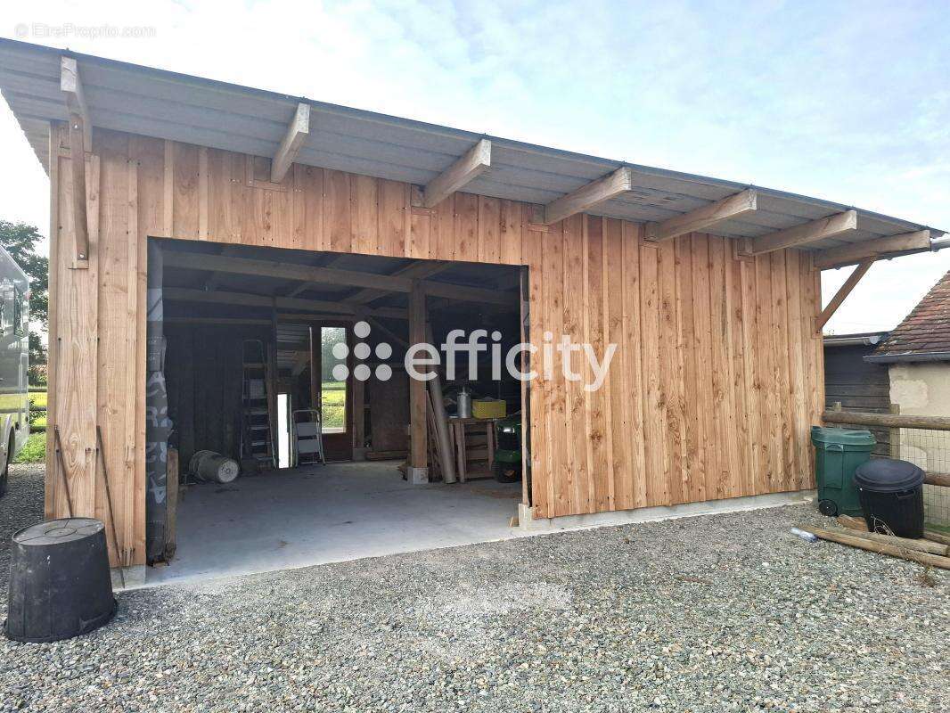 Maison à CONDE-SUR-HUISNE