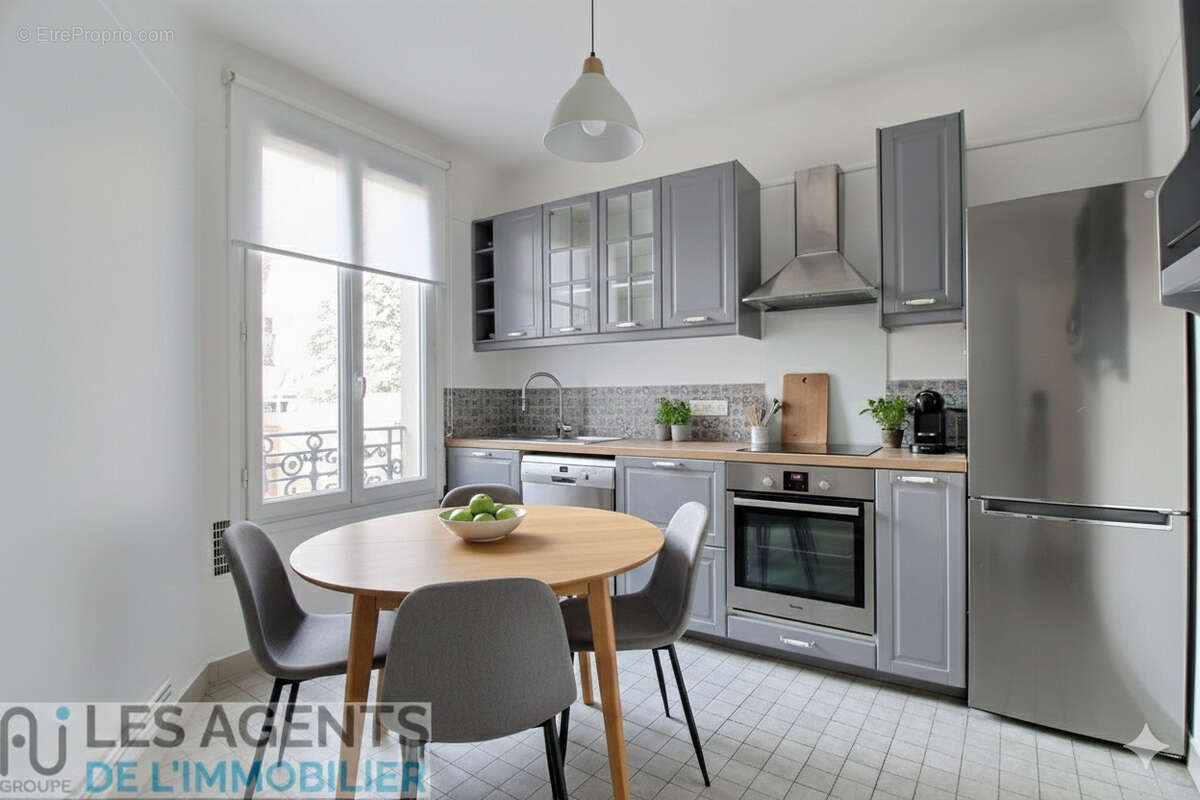 Appartement Puteaux 2 pièce(s) 50,74 m2 - photo 2
