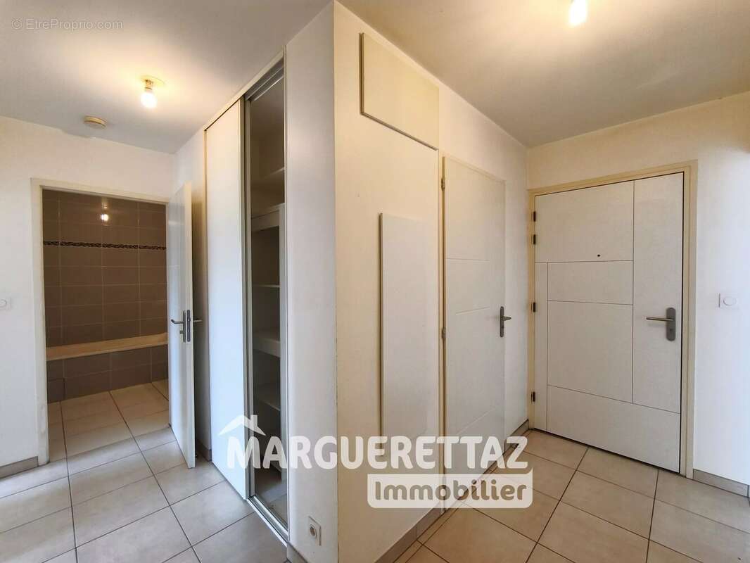 Au coeur de Reignier, T3 avec terrasse au calme + 2 places de parc en sous-sol et cave - photo 14